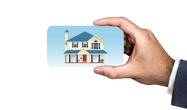 a large hand holding a business card size image of a house