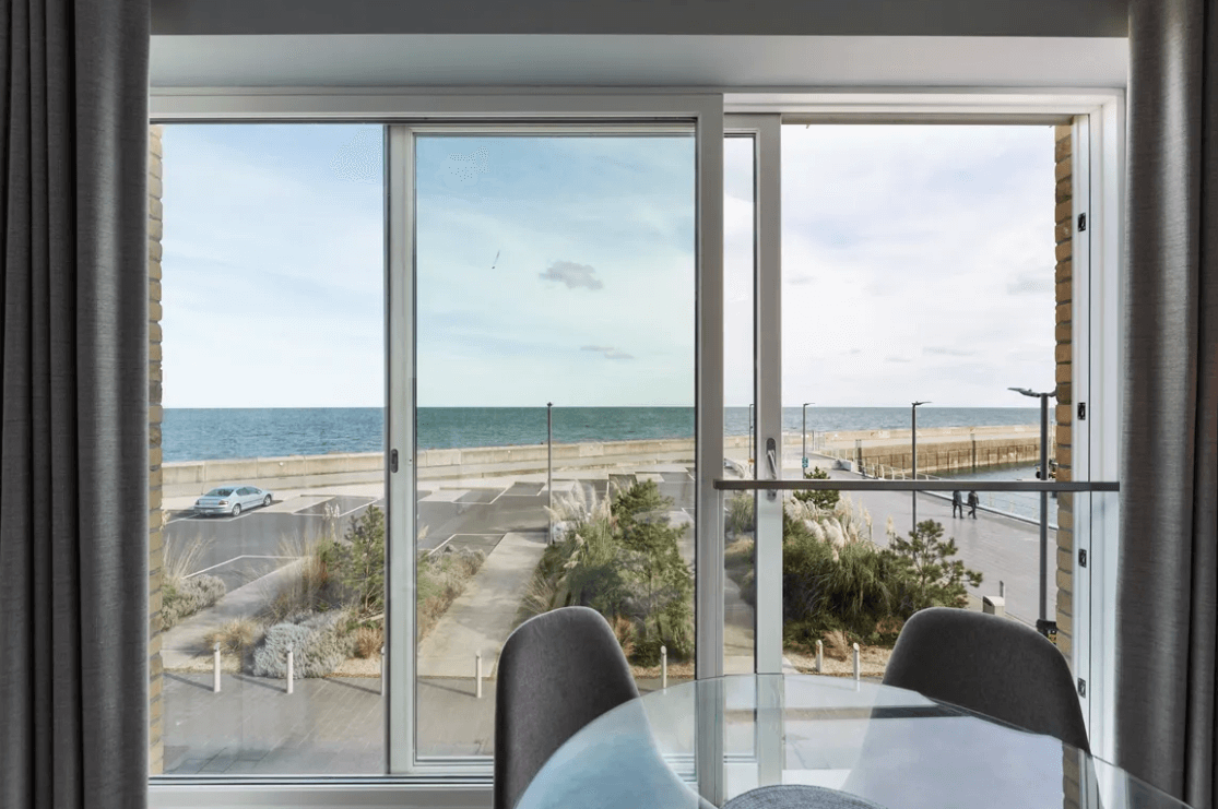59 Campion Marina Village Greystones marina view through glass sliding doors with the sea in the distance
