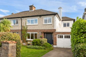 8 Beech Park Avenue Foxrock Front view of the house with the garden, garage and entrance to the property