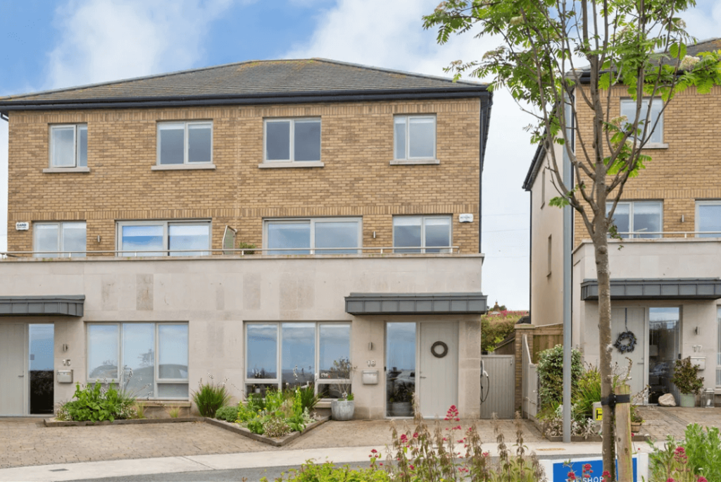 16 The Shore Greystones Wicklow George and Maguire Properties front view of the property with garden and adjacent homes